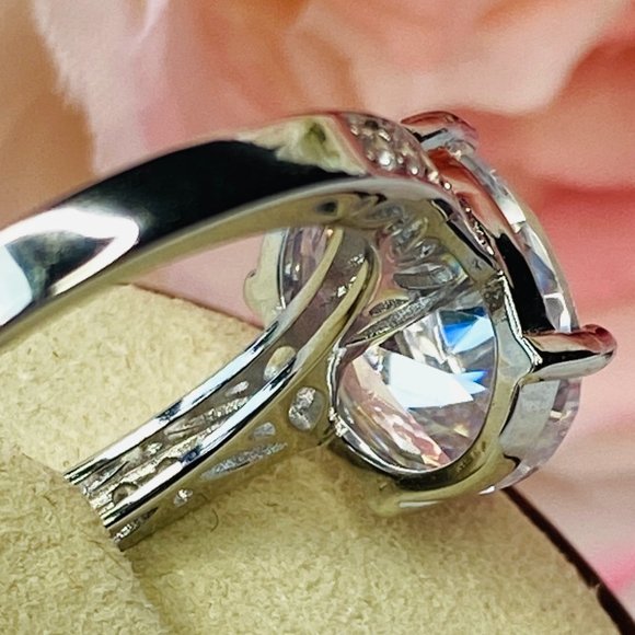 White Oval Cubic Zirconia Rhodium Over Sterling Silver Engagement Ring S… - Picture 4 of 5